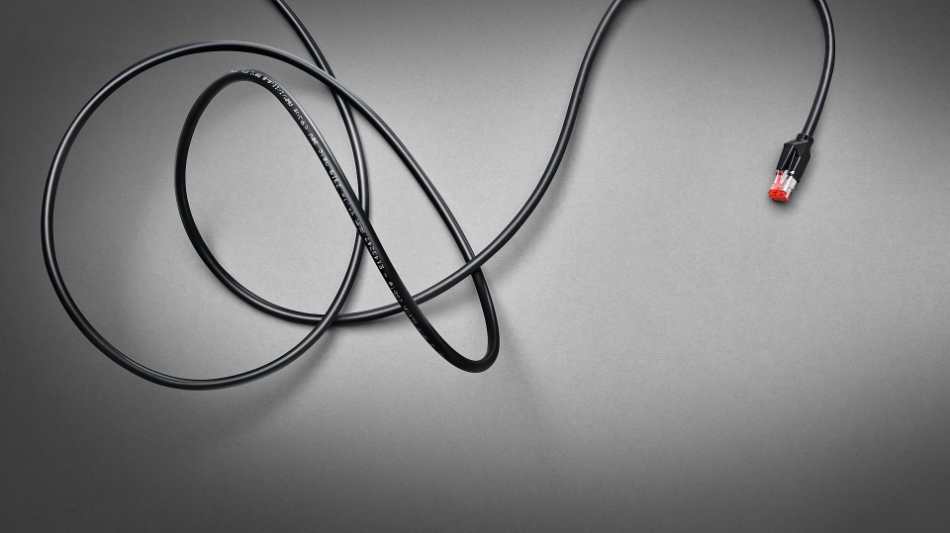 Cable coiled on a bench before install