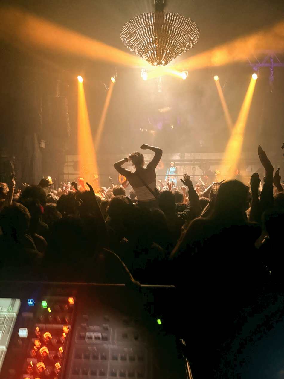 Crowd under stage lighting