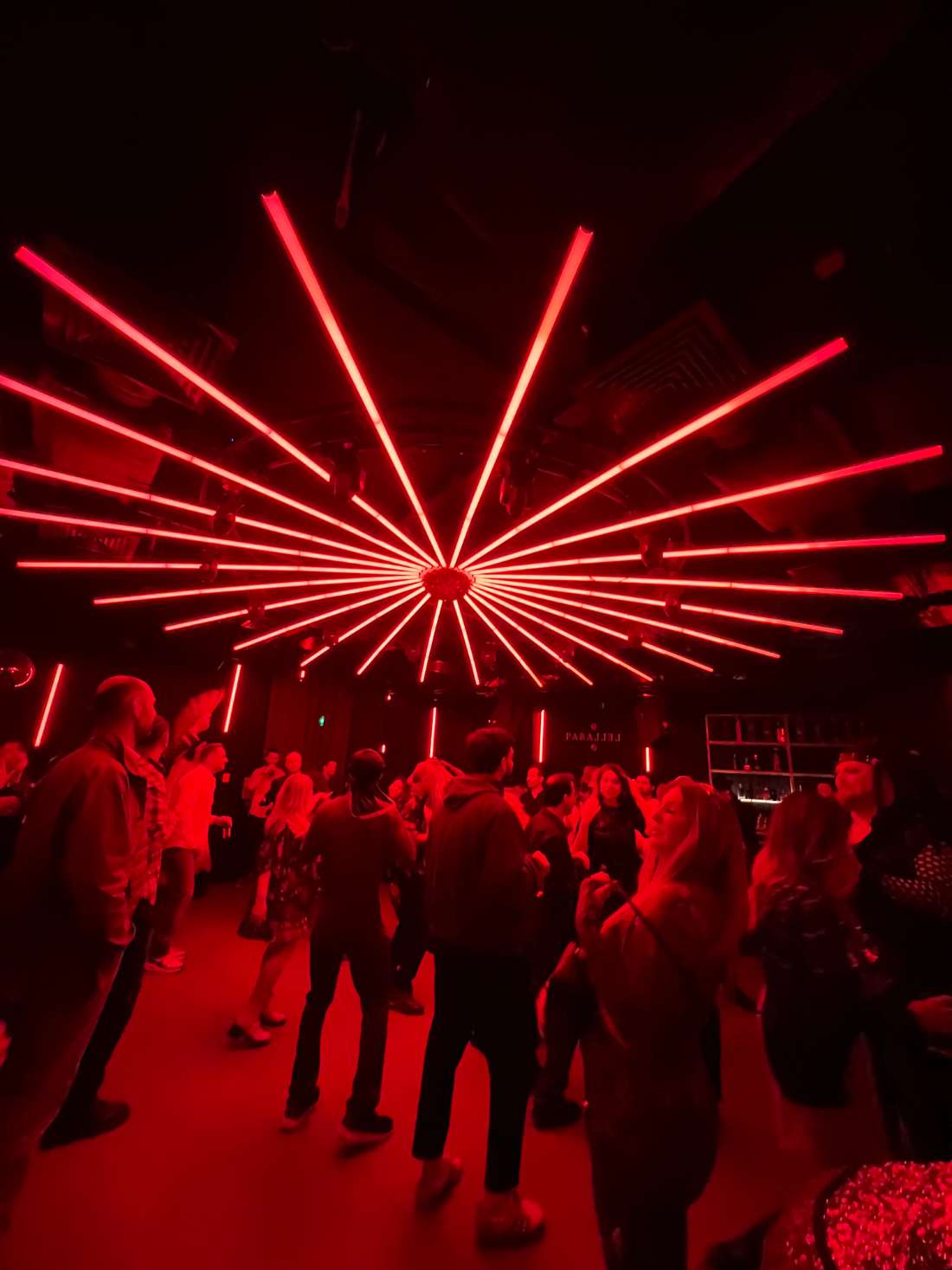 Laser fan over a full dancefloor